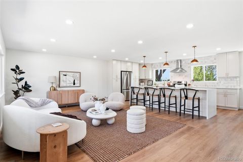 Photo of 3057 S Rosemary Street, Denver, CO 80231 (MLS # 8529097)