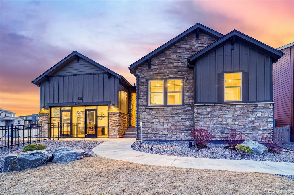 Photo of 8811 Hotchkiss Street, Littleton, CO 80125 (MLS # 9411397)