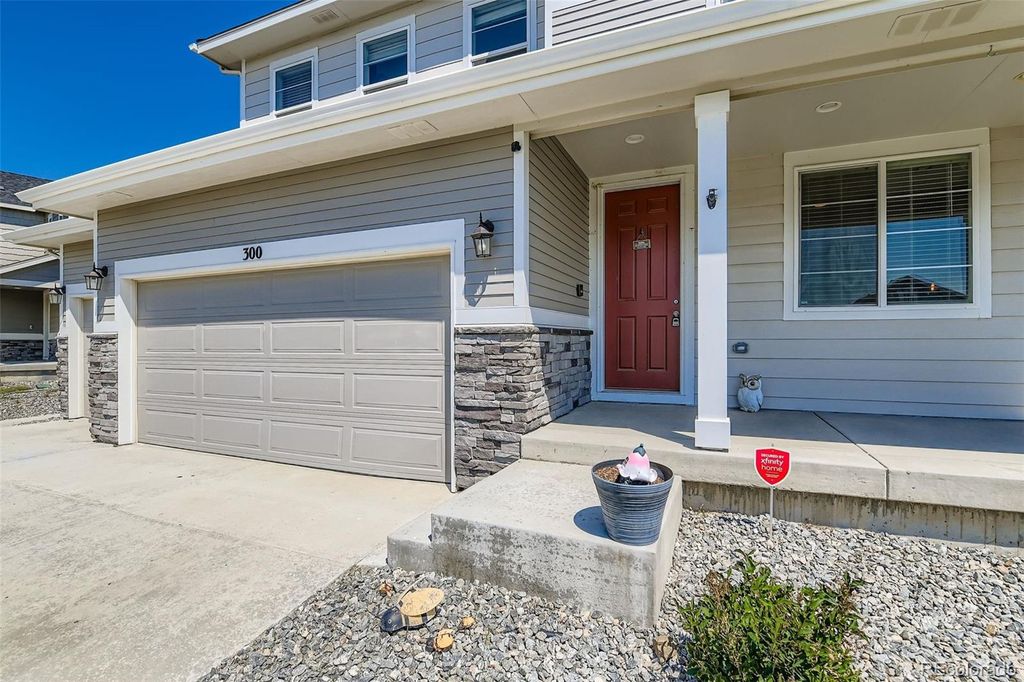 Photo of 300 Wheatberry Drive, Brighton, CO 80601 (MLS # 8002870)