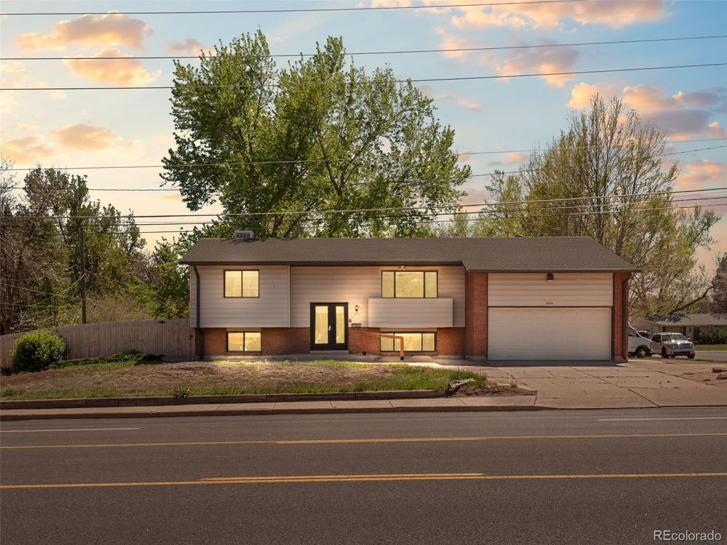 Photo of 8640 W Jewell Avenue, Lakewood, CO 80232 (MLS # 3515587)