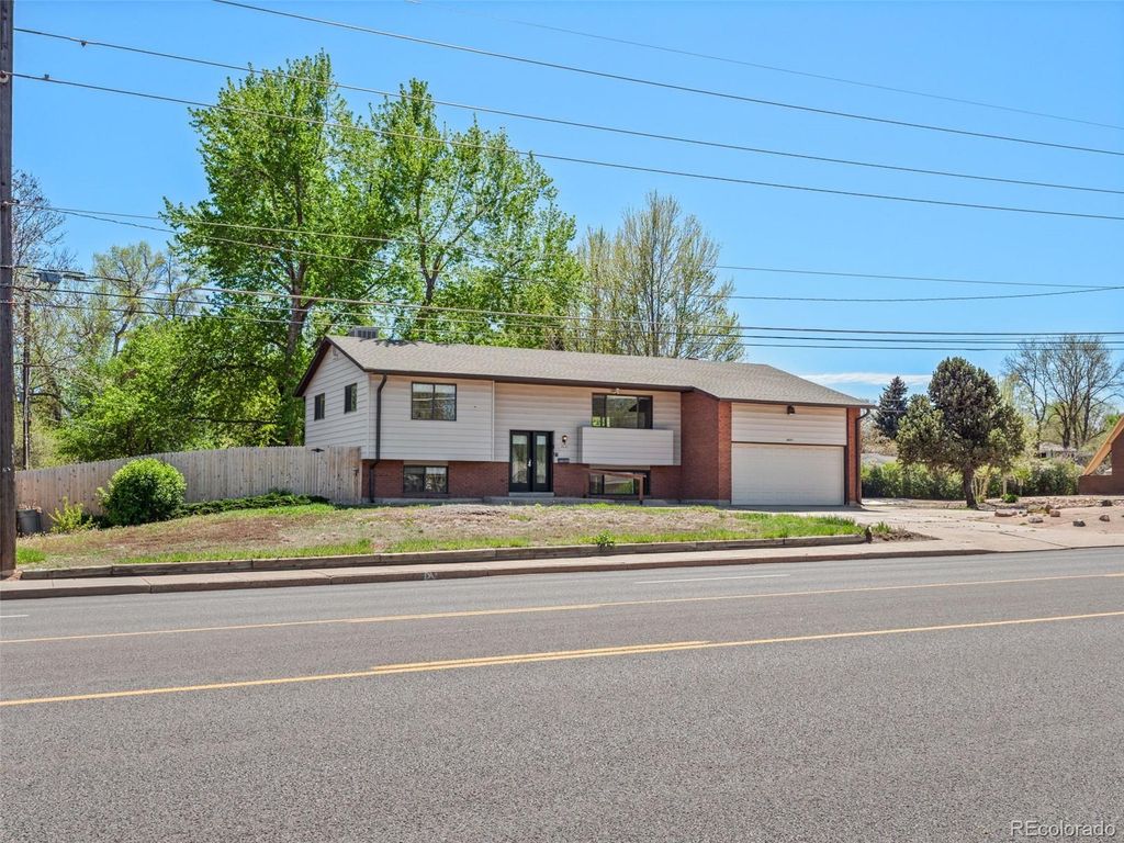 Photo of 8640 W Jewell Avenue, Lakewood, CO 80232 (MLS # 3515587)