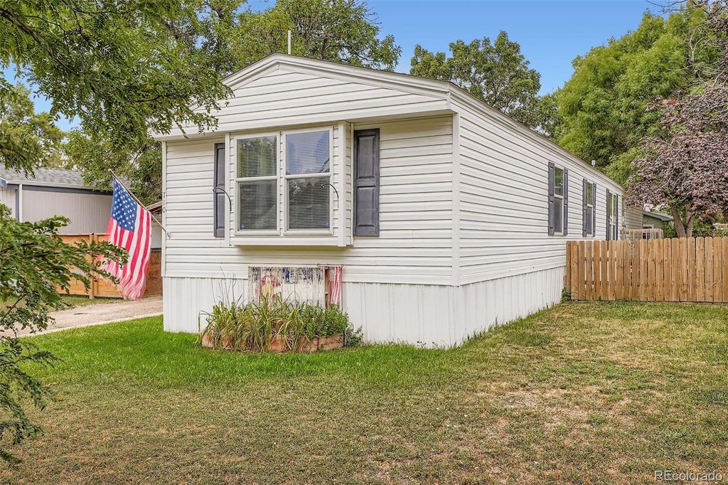 Photo of 710 E Cleveland Street, Lafayette, CO 80026 (MLS # 6293286)