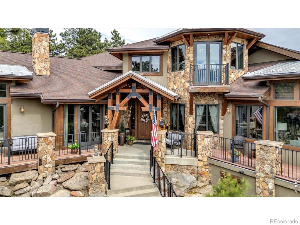 Photo of 11981 Spruce Canyon Circle, Golden, CO 80403 (MLS # IR1053482)