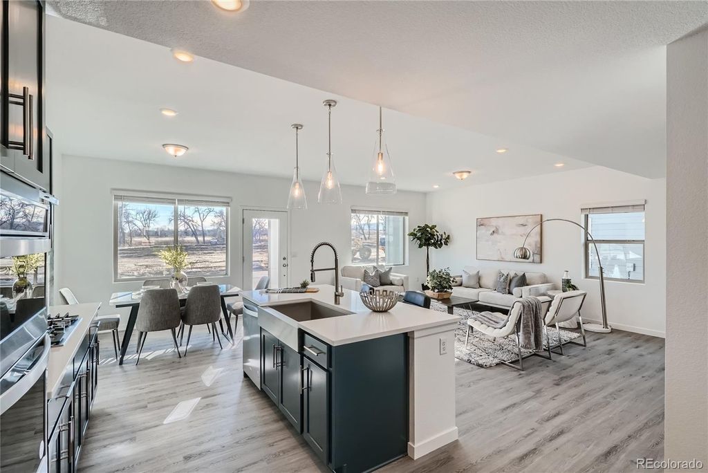 Photo of 15326 W 68th Loop, Arvada, CO 80007 (MLS # 8834207)