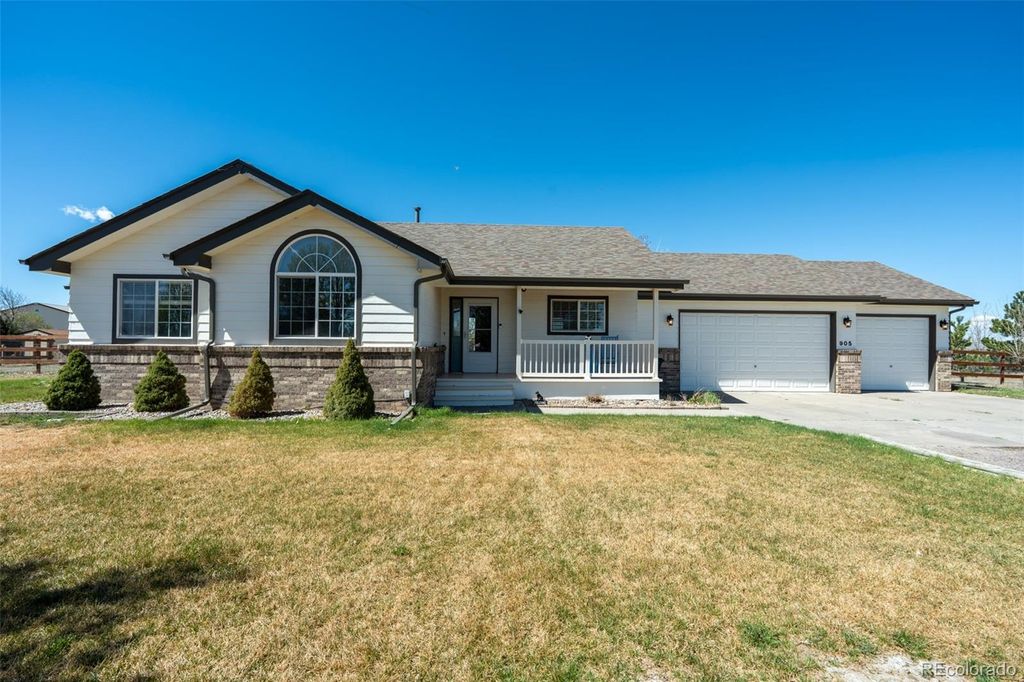 Photo of 905 Pawnee Street, Strasburg, CO 80136 (MLS # 6228175)