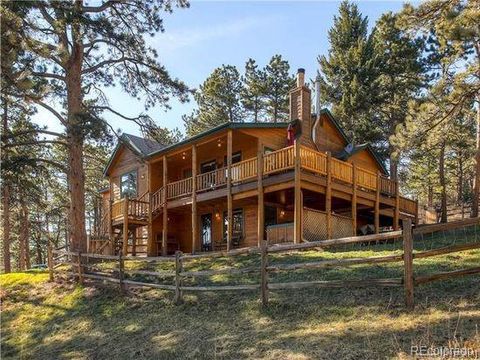 Photo of 9808 Fallen Rock Road, Conifer, CO 80433 (MLS # 4420360)
