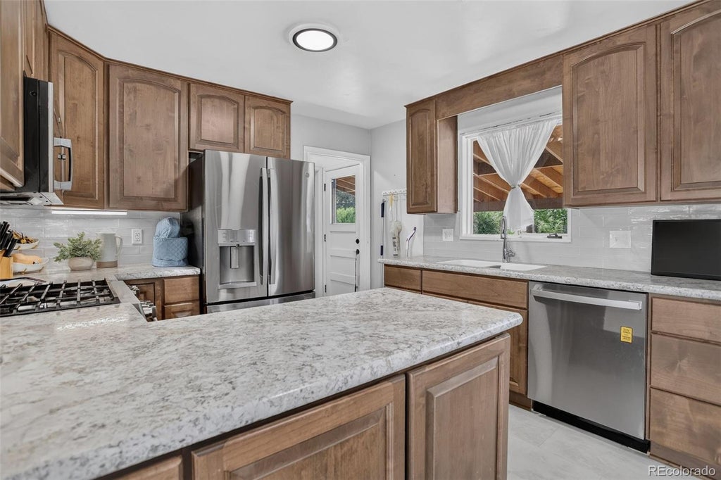 Photo of 2940 W Saratoga Avenue, Englewood, CO 80110 (MLS # 4996252)