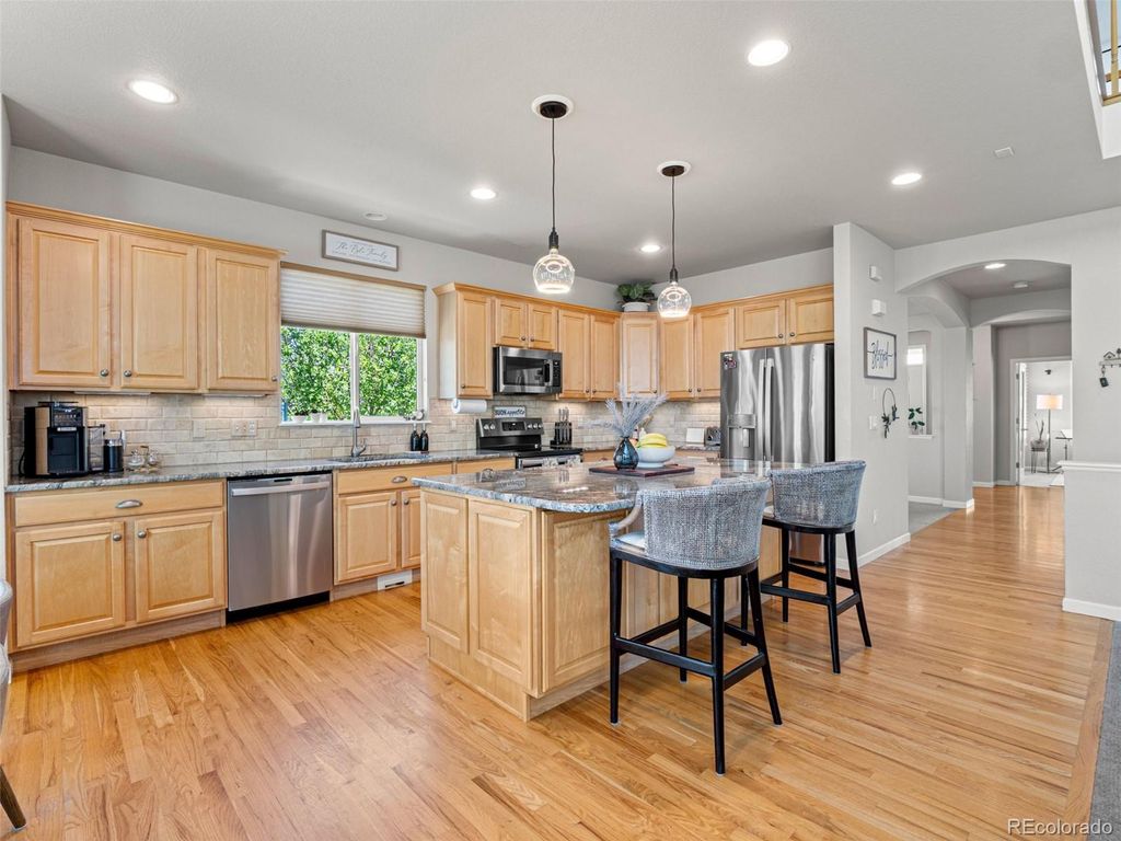 Photo of 8310 Arbutus Street, Arvada, CO 80005 (MLS # 3032635)