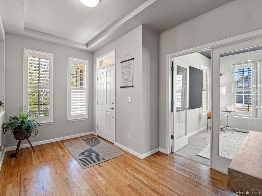 Photo of 8310 Arbutus Street, Arvada, CO 80005 (MLS # 3032635)