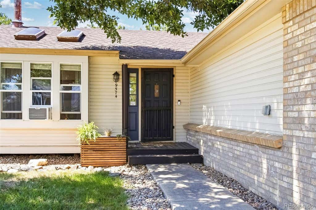 Photo of 9574 W Elmhurst Place, Littleton, CO 80128 (MLS # 7207888)