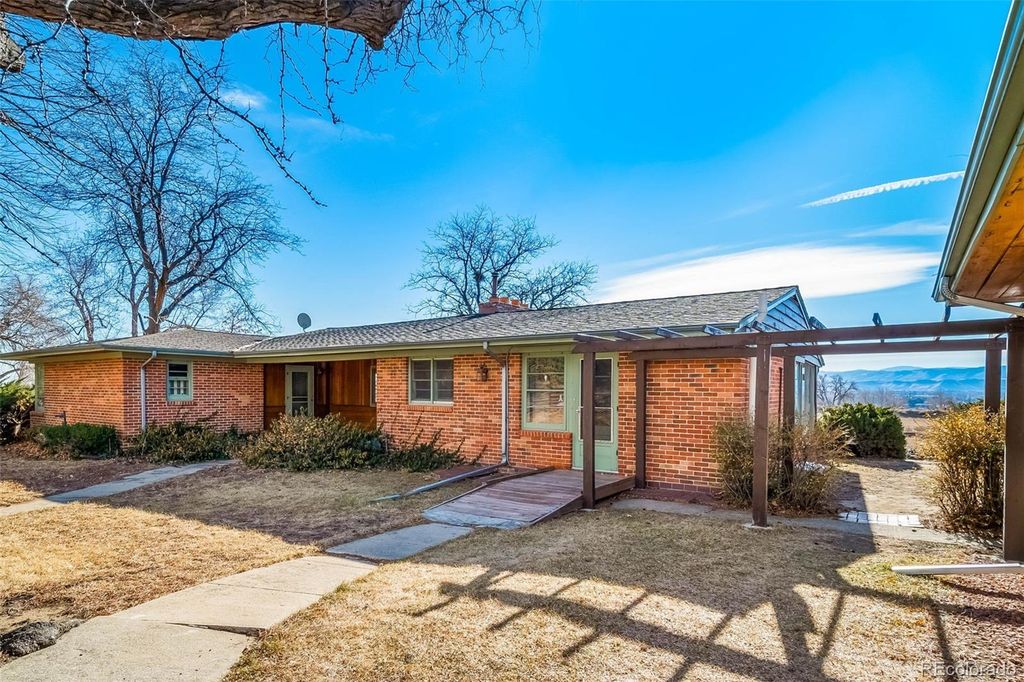 Photo of 10250 W 73rd Place, Arvada, CO 80005 (MLS # 9110409)