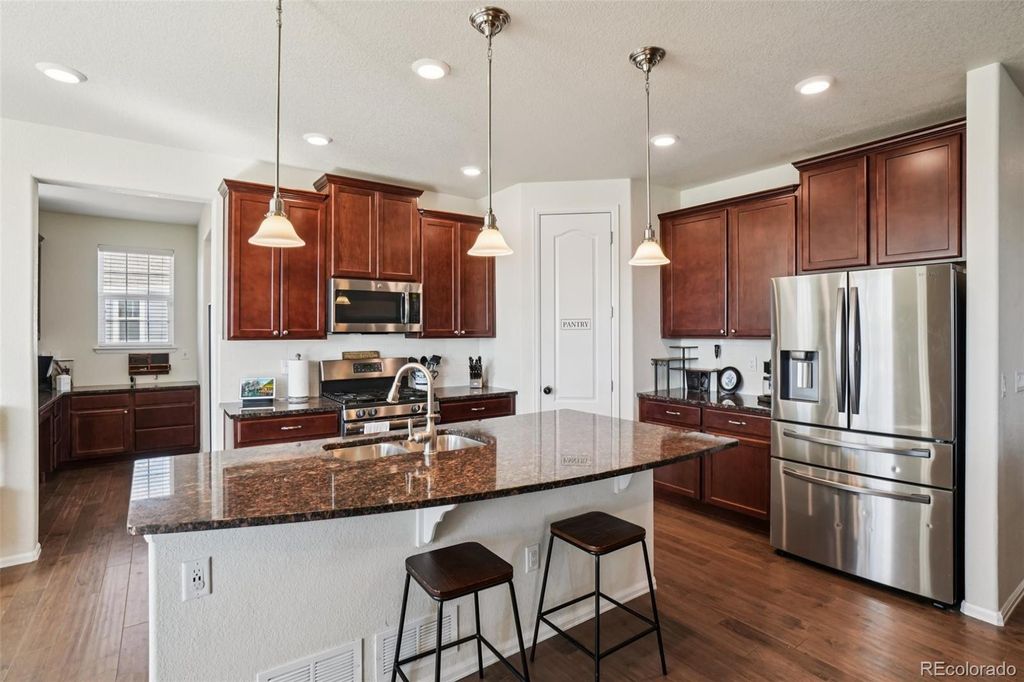 Photo of 2342 E 161st Court, Thornton, CO 80602 (MLS # 5039347)