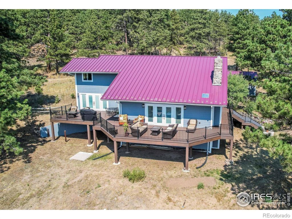 Photo of 10297 Forest View Drive, Loveland, CO 80538 (MLS # IR1041911)