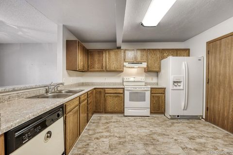 Photo of 15455 E Louisiana Avenue, Aurora, CO 80017 (MLS # 2165244)