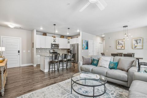 Photo of 15345 W 64th Lane #107, Arvada, CO 80007 (MLS # 2738025)