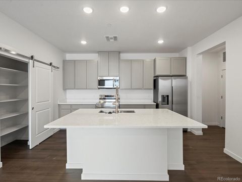 Photo of 6153 N Ceylon Street #304, Denver, CO 80249 (MLS # 3459148)