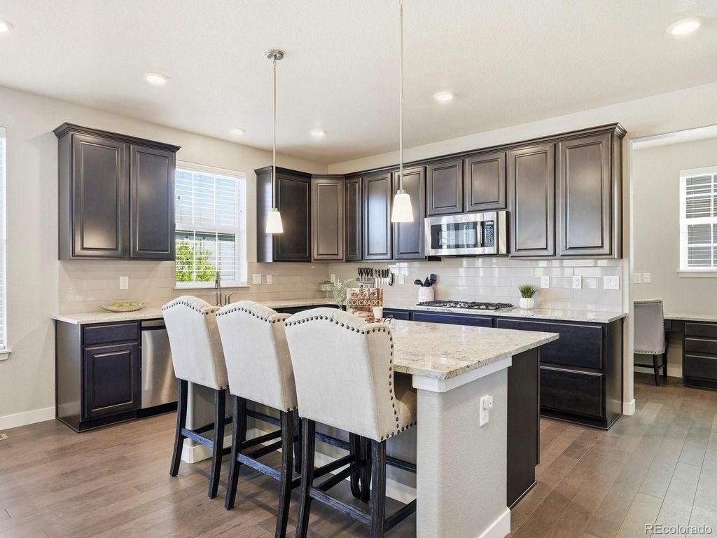 Photo of 8275 Arapahoe Peak Street, Littleton, CO 80125 (MLS # 7657566)