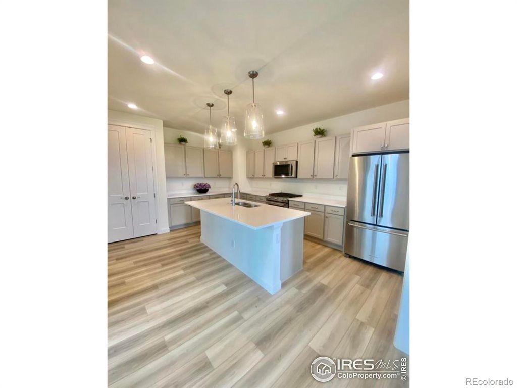 Photo of 1472 Peach Avenue, Erie, CO 80516 (MLS # IR1045090)