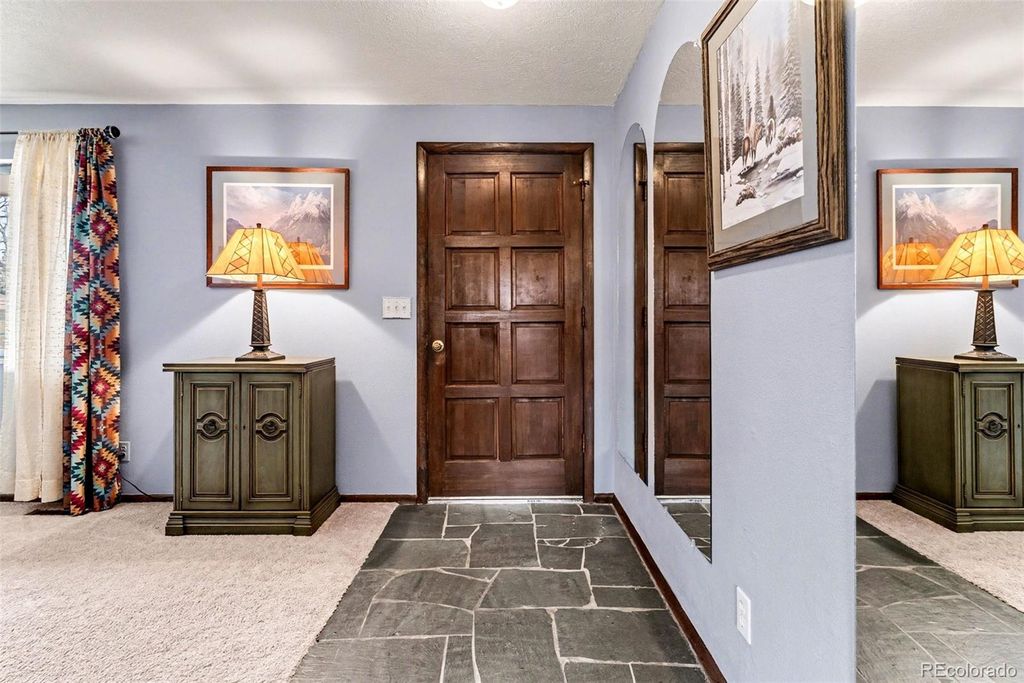 Photo of 7654 Lewis Street, Arvada, CO 80005 (MLS # 3595002)