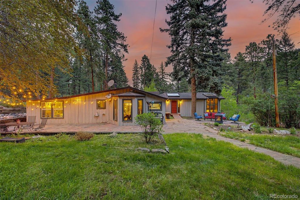 Photo of 8297 S Deer Creek Canyon Road, Littleton, CO 80127 (MLS # 5309966)