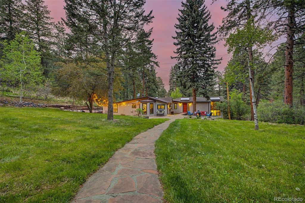 Photo of 8297 S Deer Creek Canyon Road, Littleton, CO 80127 (MLS # 5309966)