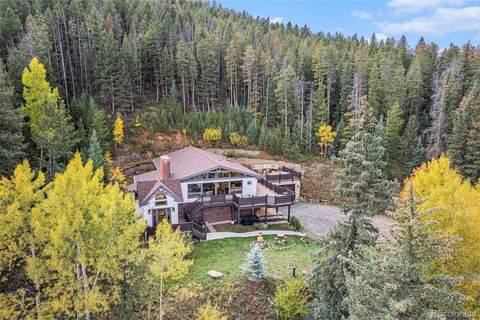 Photo of 1774 Upper Bear Creek Road, Evergreen, CO 80439 (MLS # 9638184)