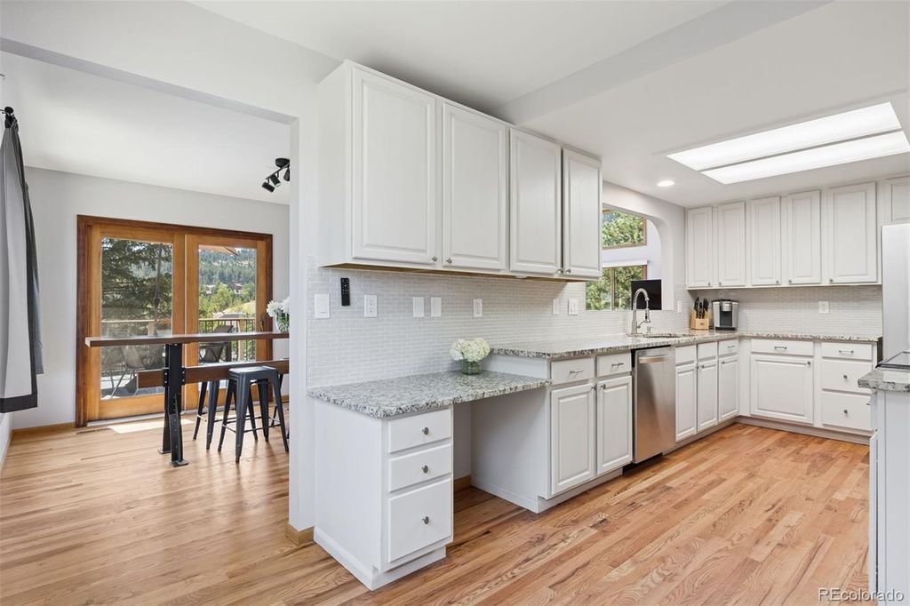 Photo of 23860 Genesee Village Road, Golden, CO 80401 (MLS # 8327685)