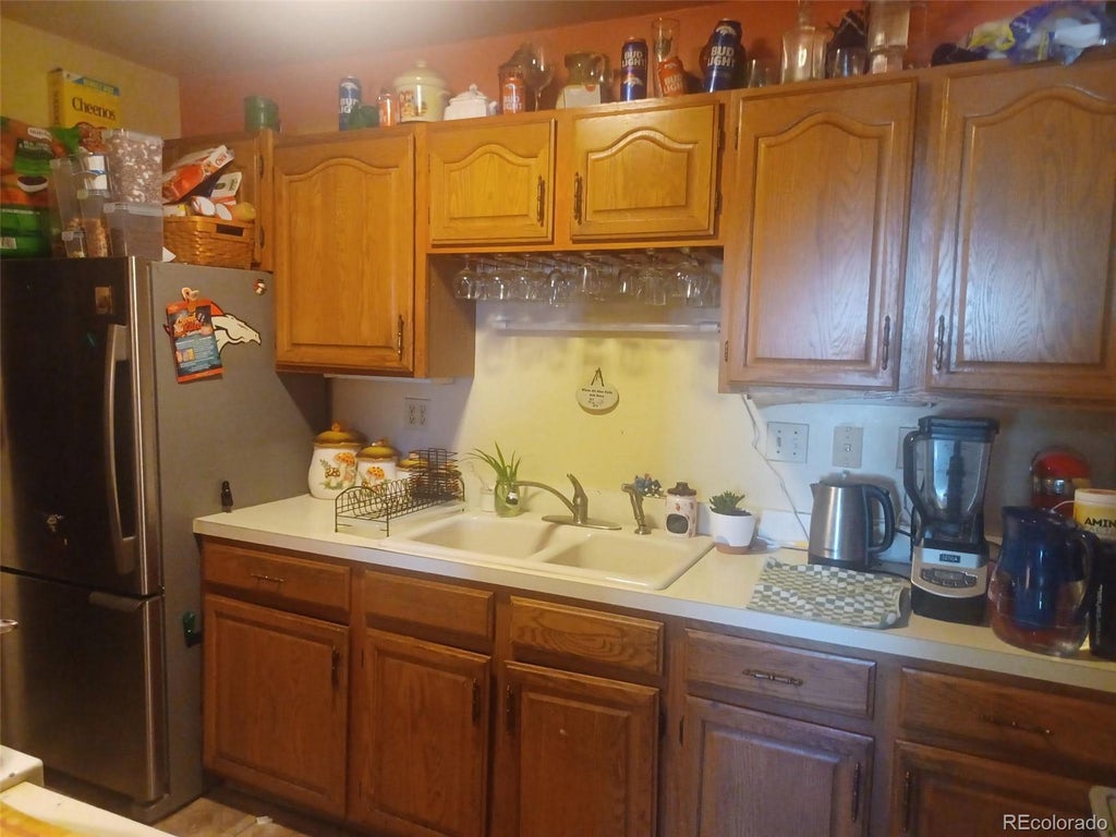 Photo of 1280 S Wolff Street, Denver, CO 80219 (MLS # 2112883)