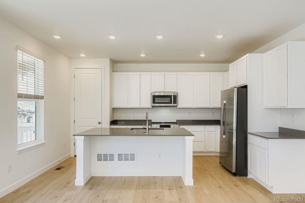 Photo of 12680 W Glasgow Place, Littleton, CO 80127 (MLS # 7952454)