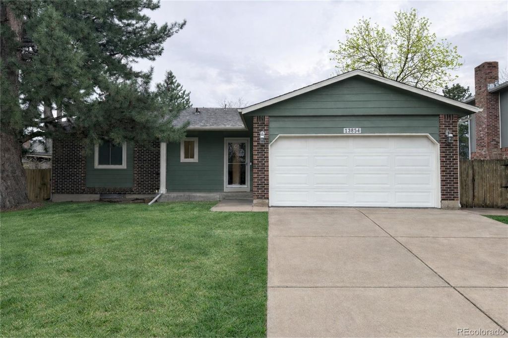 Photo of 13854 W 67th Way, Arvada, CO 80004 (MLS # 9811160)