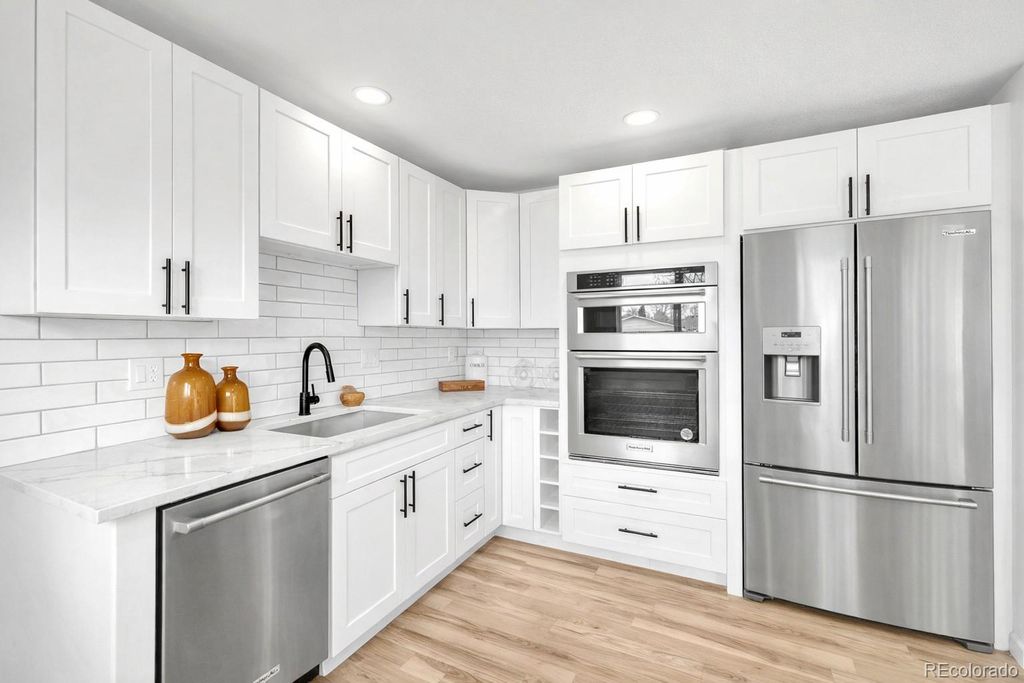 Photo of 3320 W Saratoga Avenue, Englewood, CO 80110 (MLS # 2712590)