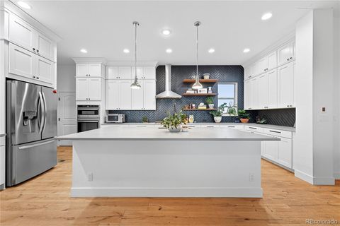 Photo of 18422 W 95th Avenue, Arvada, CO 80007 (MLS # 7574783)