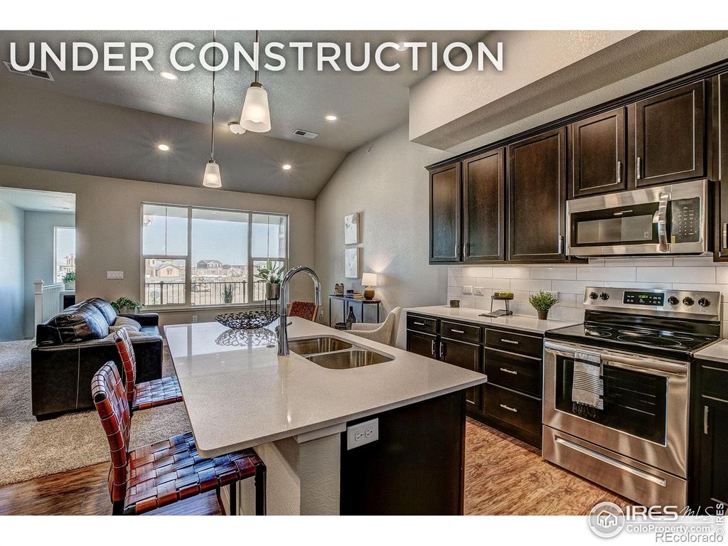 Photo of 410 High Point Drive #202, Longmont, CO 80504 (MLS # IR1045720)