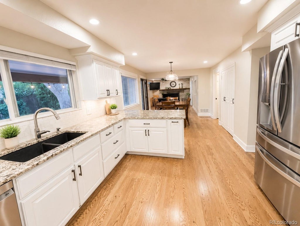 Photo of 7117 S Newland Street, Littleton, CO 80128 (MLS # 6564306)
