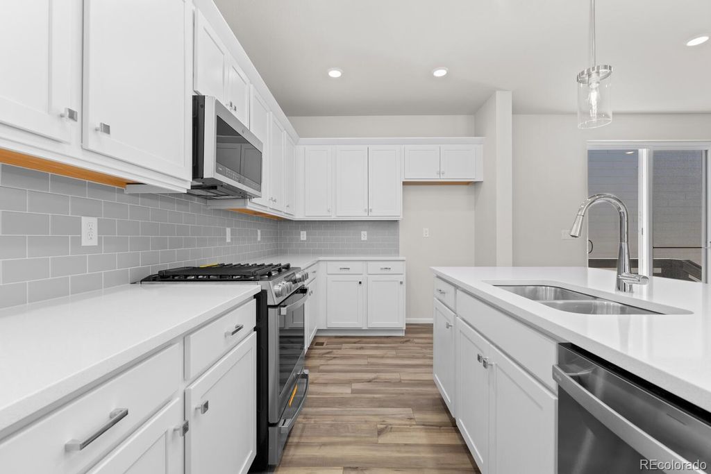 Photo of 7392 Watercress Drive, Littleton, CO 80125 (MLS # 3941624)