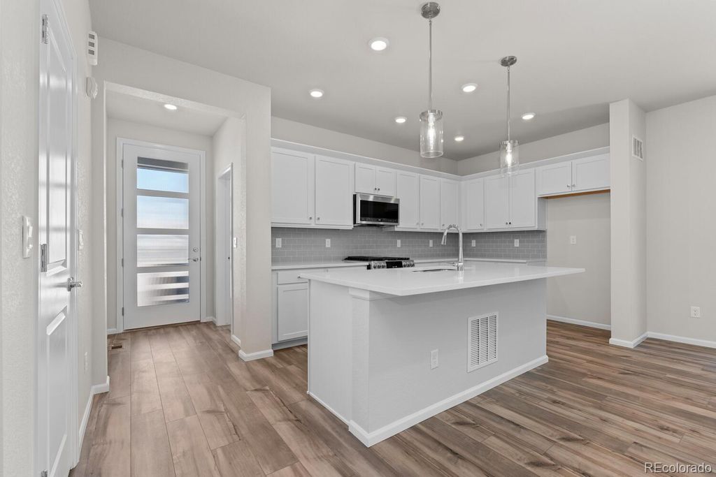 Photo of 7392 Watercress Drive, Littleton, CO 80125 (MLS # 3941624)