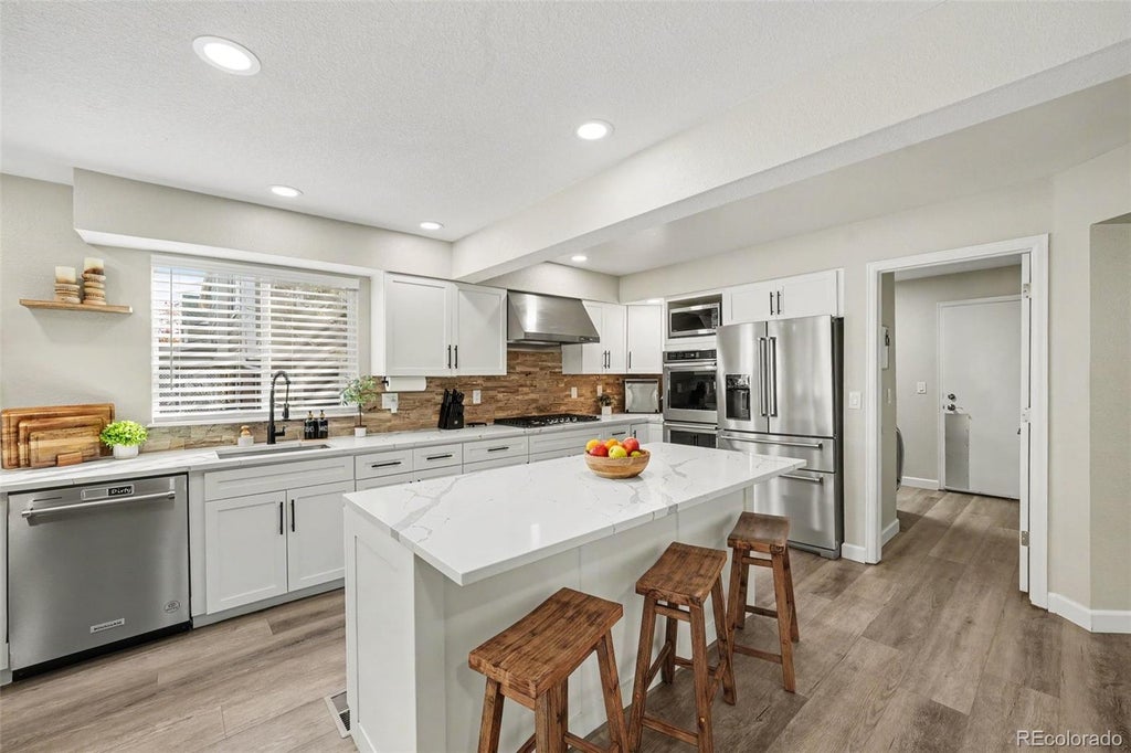 Photo of 8249 W Phillips Avenue, Littleton, CO 80128 (MLS # 5297703)