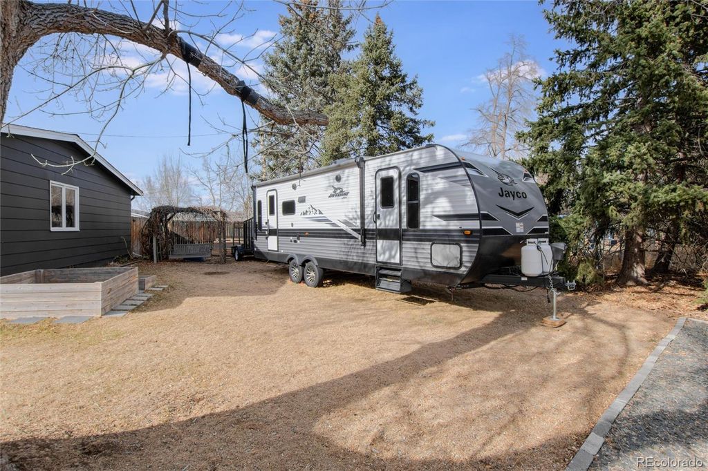 Photo of 5819 W Elmhurst Drive, Littleton, CO 80128 (MLS # 8913790)