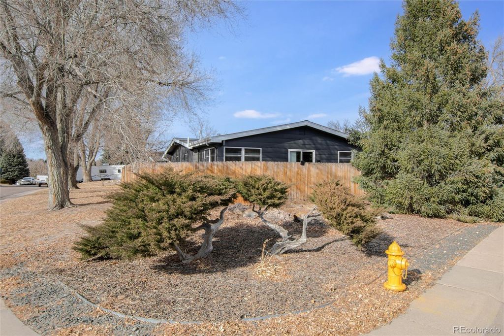 Photo of 5819 W Elmhurst Drive, Littleton, CO 80128 (MLS # 8913790)