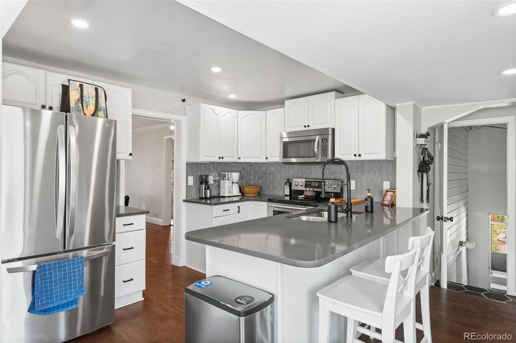 Photo of 1111 E Dartmouth Avenue, Englewood, CO 80113 (MLS # 1938312)