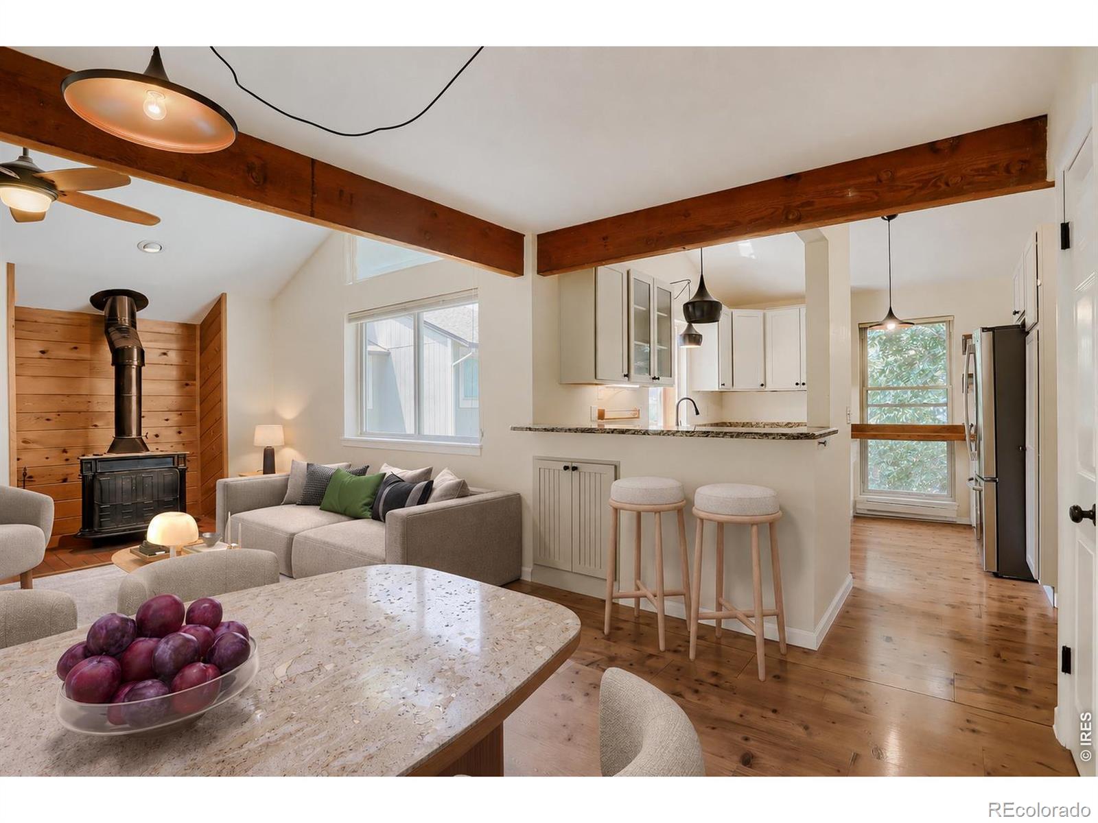 Kitchen, dining and living room, all open to one bright sunny space