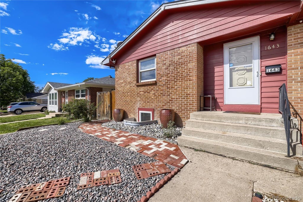 Photo of 1643 S Quitman Street, Denver, CO 80219 (MLS # 1521606)