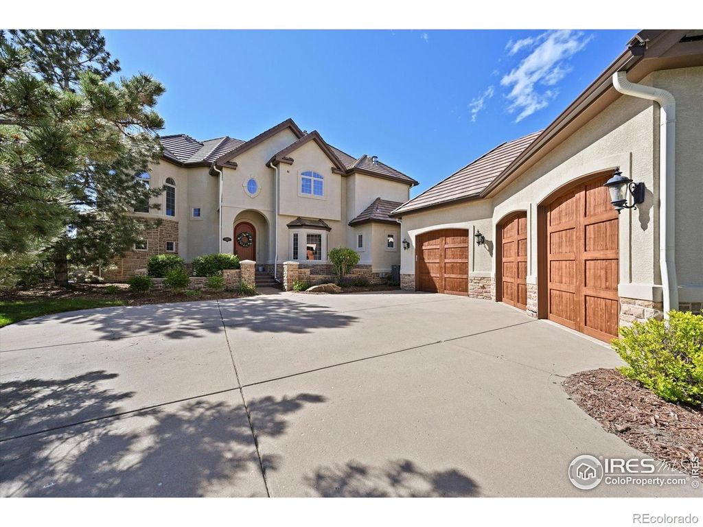 Photo of 1287 Buffalo Ridge Road, Castle Pines, CO 80108 (MLS # IR1042839)