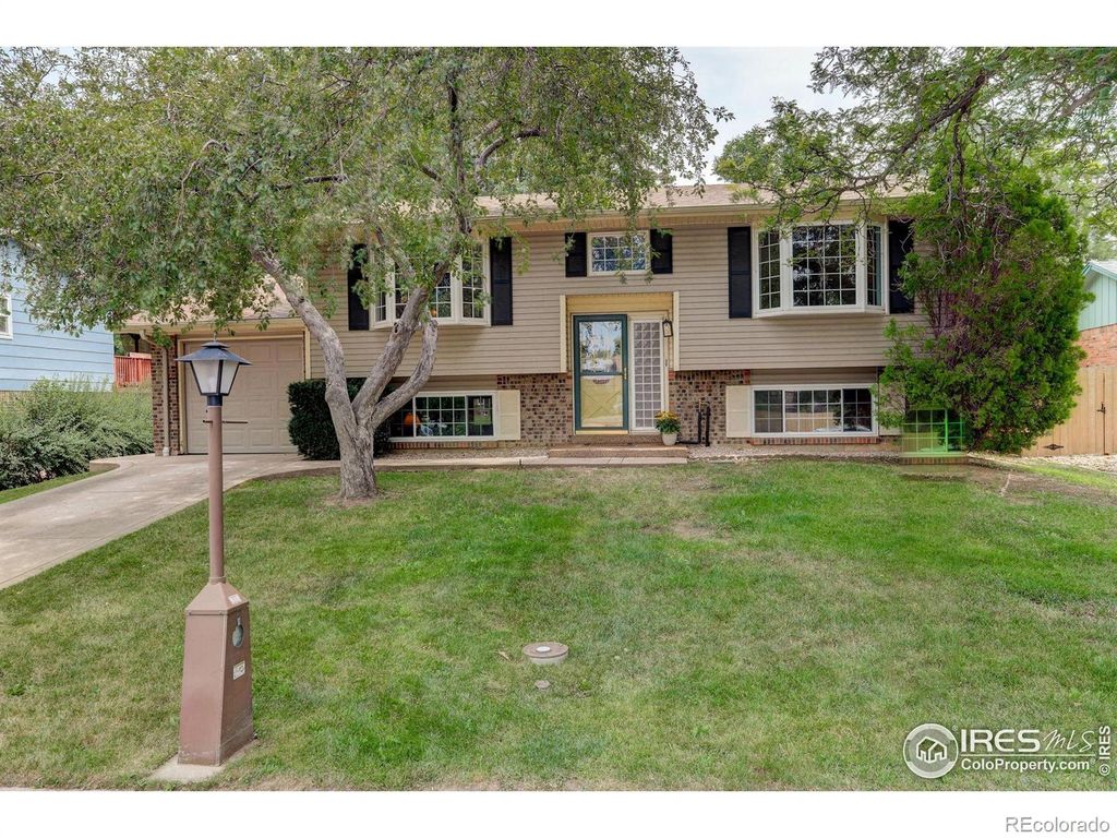 Photo of 1327 Brookfield Drive, Longmont, CO 80501 (MLS # IR1044568)