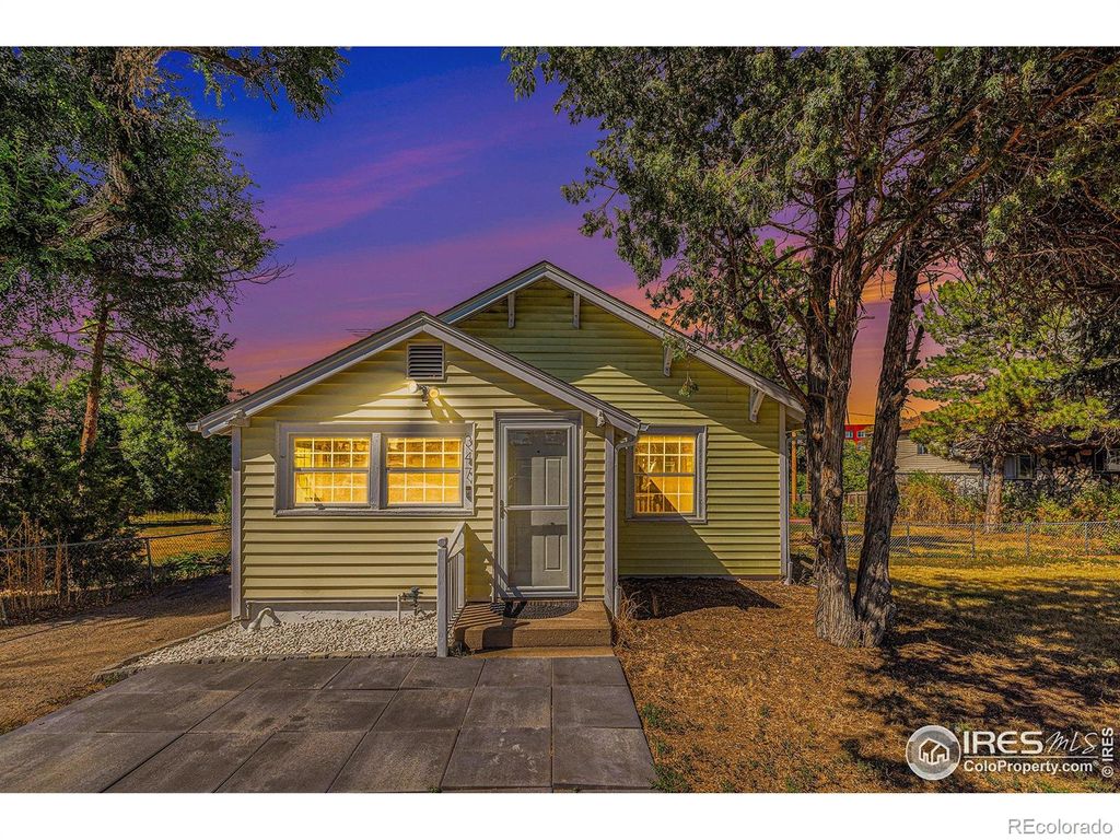 Photo of 347 W Rafferty Gardens Avenue, Littleton, CO 80120 (MLS # IR1056887)