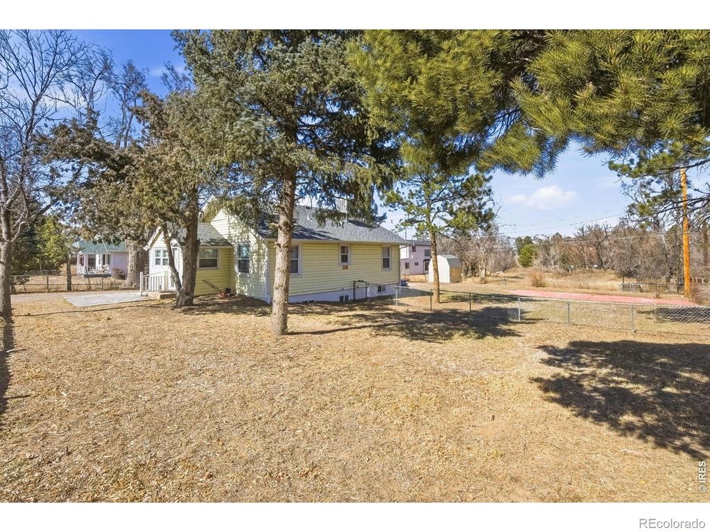 Photo of 347 W Rafferty Gardens Avenue, Littleton, CO 80120 (MLS # IR1056887)