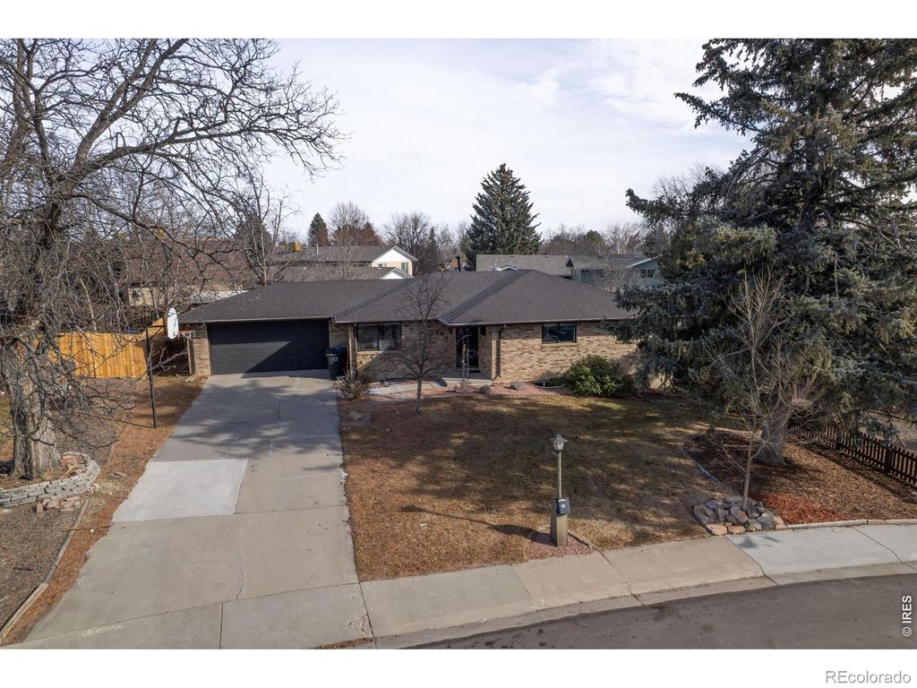 Photo of 28 University Drive, Longmont, CO 80503 (MLS # IR1053042)
