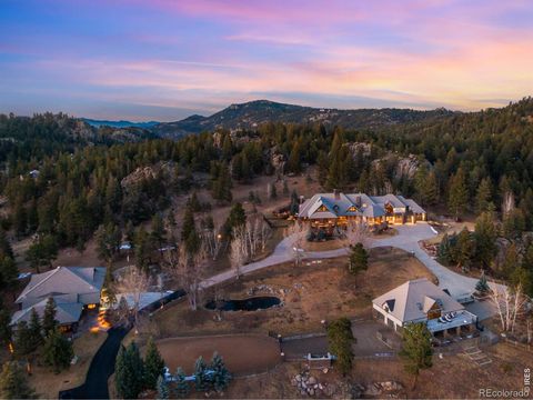 Photo of 6917 Timbers Drive, Evergreen, CO 80439 (MLS # IR1053968)
