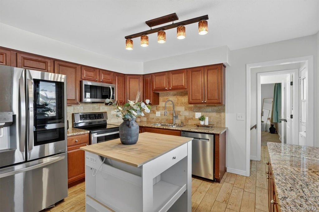 Photo of 1348 S Drexel Way, Lakewood, CO 80232 (MLS # 5693503)