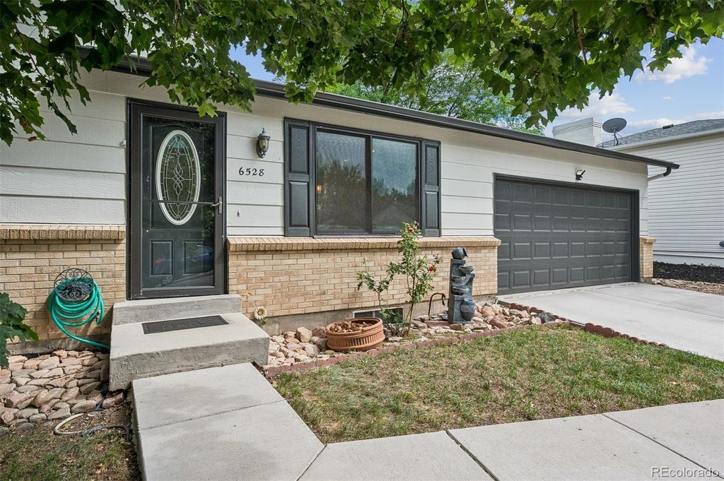 Photo of 6528 S Everett Way, Littleton, CO 80123 (MLS # 5162826)